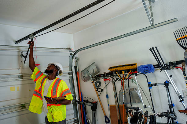 Professional Garage Door Panel Replacement technician working in East Massapequa, NY